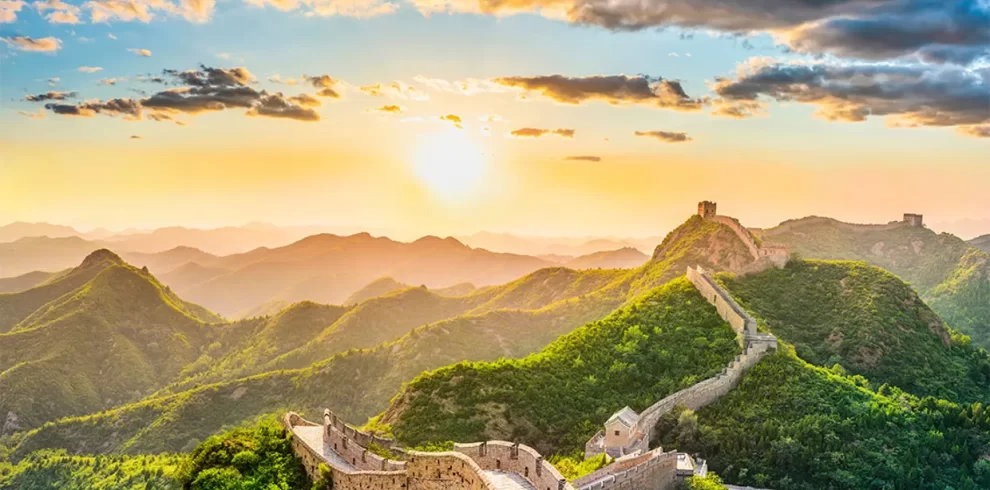 The Travellers - Sunset view from the Great Wall of China during guided China tour