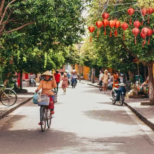 Travellers riding motorbikes, Bikes through the historic streets of Hue