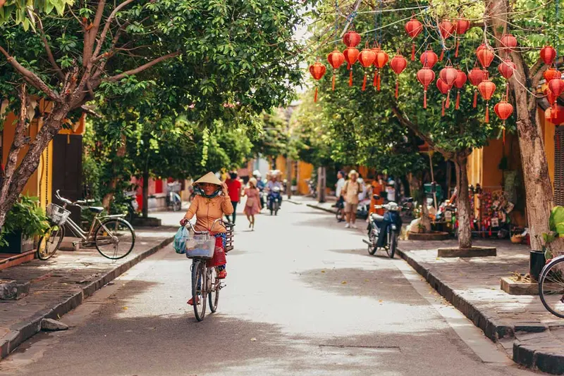 Travellers riding motorbikes, Bikes through the historic streets of Hue