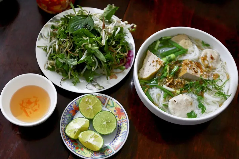 Authentic Vietnamese dishes including pho, banh mi, and fresh local specialties